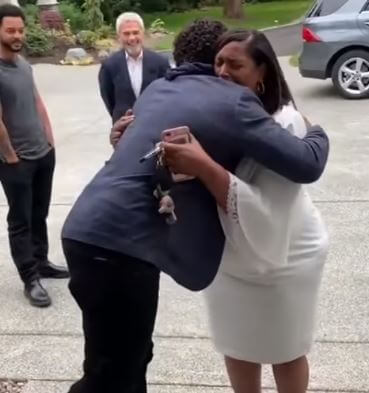 Tammy is hugging her son after the surprise